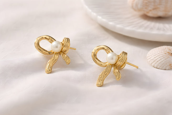 Ribbed Gold Bow & Pearl Stud Earrings