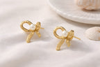 Ribbed Gold Bow & Pearl Stud Earrings