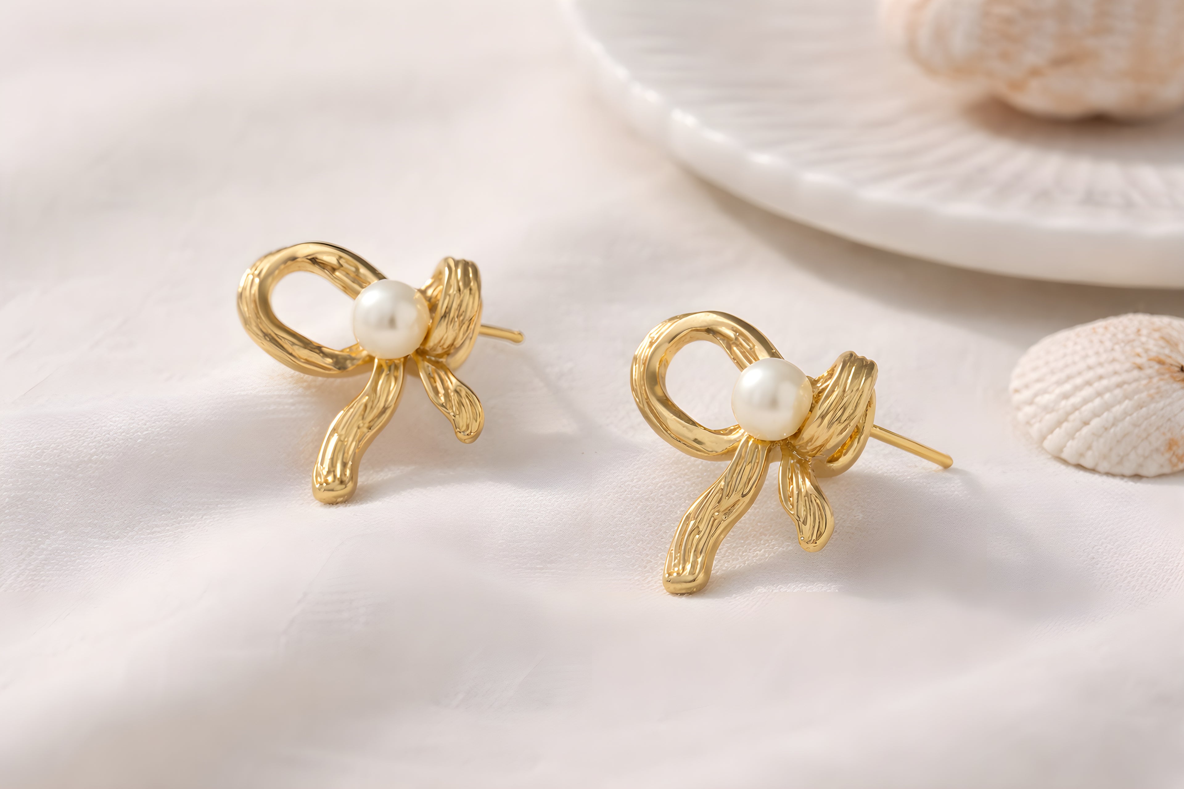 Ribbed Gold Bow & Pearl Stud Earrings